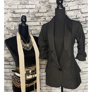 Xs “extra small” black blazer. With bunched sleeves.